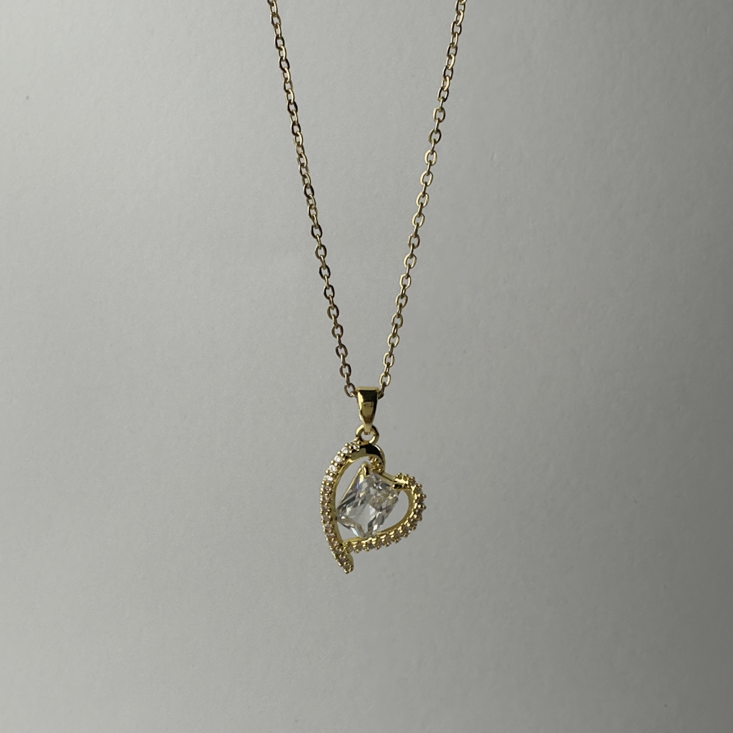 Heart Captured White Sapphire Necklace close up by SVORA