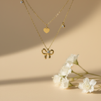 Bow and Heart With Solitare Charms Layered Necklace close up by SVORA