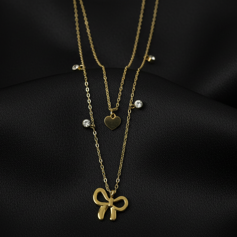 Bow and Heart With Solitare Charms Layered Necklace by SVORA