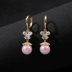 Pink Pearl Butterfly Dangler Earrings by SVORA