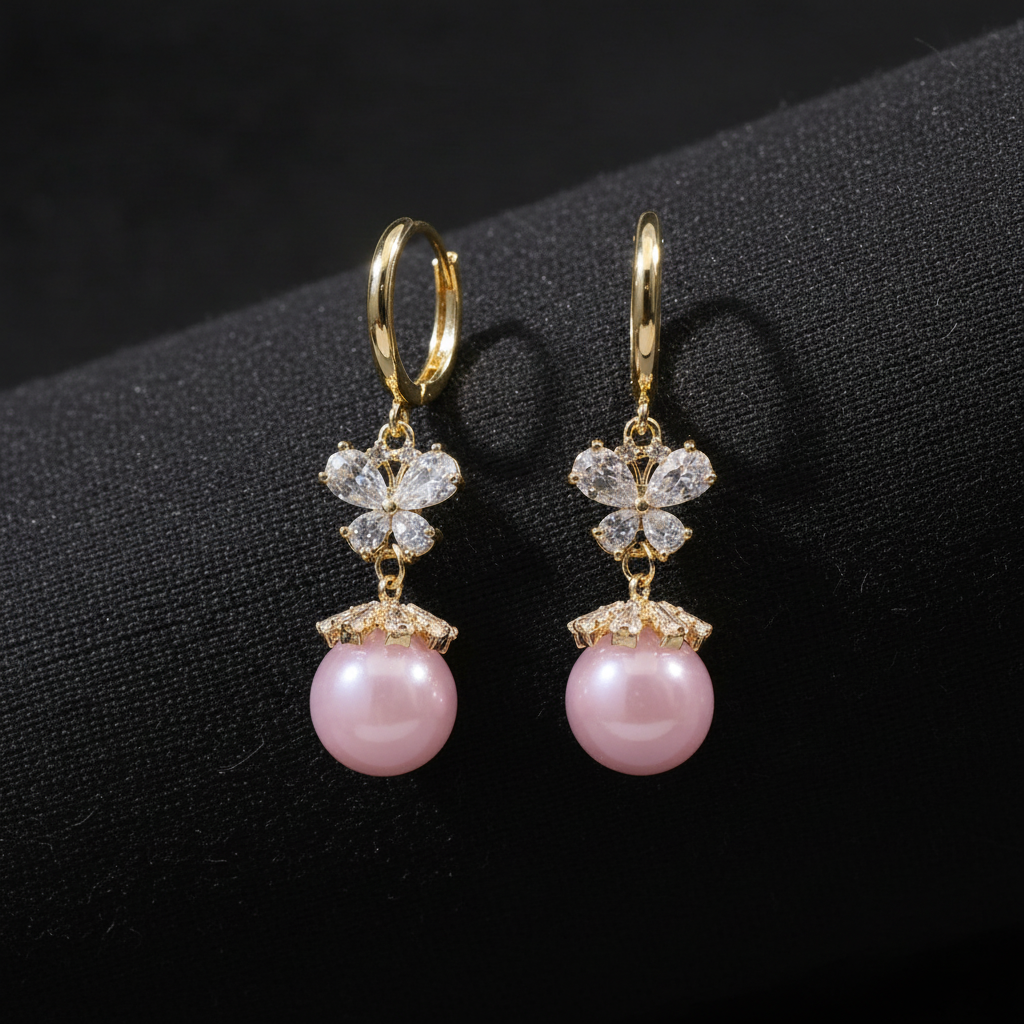 Pink Pearl Butterfly Dangler Earrings by SVORA