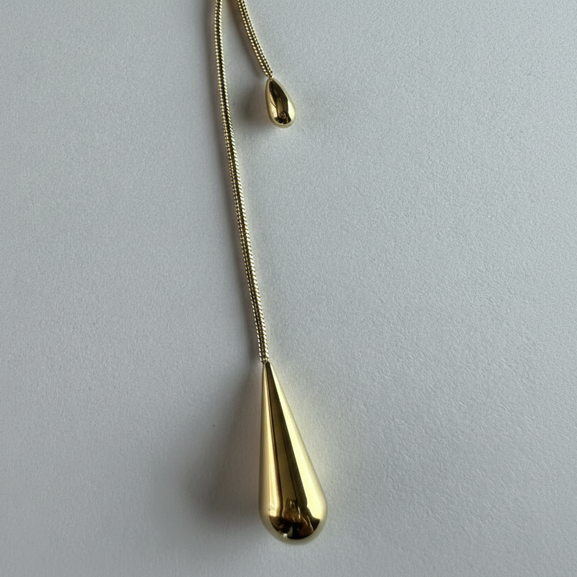 Golden Tear Drop Lariat Necklace close up by SVORA