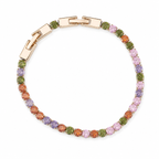 A multi-colored gemstone tennis bracelet with alternating green, orange, purple, and pink round stones set in a rose gold-tone band with a clasp, shown on a plain white background.