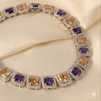 SVORA amethyst and peach champagne CZ halo tennis bracelet with princess-cut links in silver.