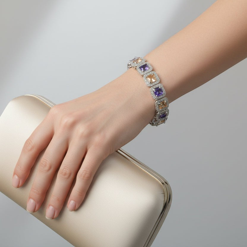 SVORA amethyst and peach champagne CZ halo tennis bracelet with princess-cut links set in silver. Rhodium plated, waterproof.