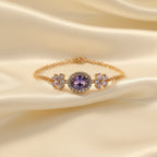 SVORA Amethyst oval layered bracelet with CZ halo and purple flower accents on a rose gold chain. Waterproof and anti-tarnish.