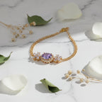 SVORA Amethyst oval layered bracelet with CZ halo and floral accents on a rose gold chain. Waterproof, anti-tarnish.