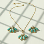 SVORA aqua pearl necklace and earrings set with gold-tone chain and fan-shaped sea-green enamel pendants.