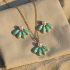 SVORA aqua pearl necklace and earrings set with sea-green enamel and gold detail, featuring a fan flower silhouette.