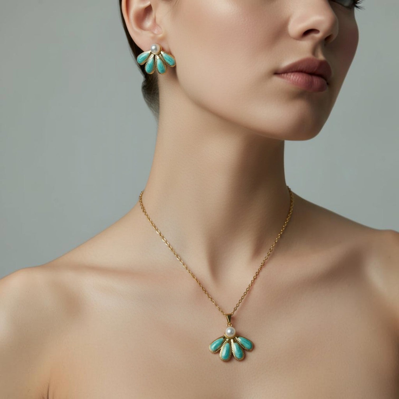 SVORA aqua pearl necklace and earrings set with sea-green enamel and gold detail.