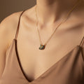 SVORA gold plated stainless steel necklace with a black swan pendant pavé-set in jet-black CZ.