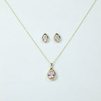 SVORA blush pear-cut crystal pendant necklace and matching stud earrings set in gold-tone stainless steel.