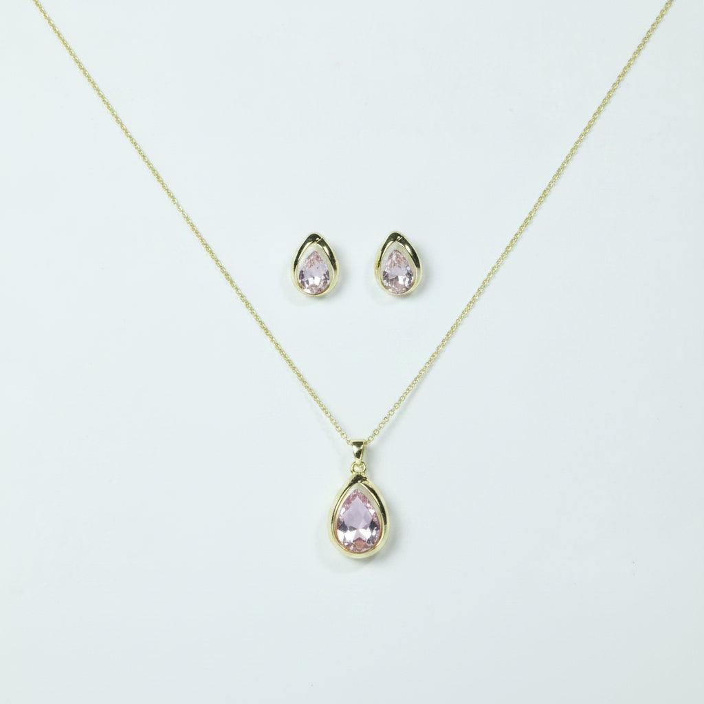 SVORA blush pear-cut crystal pendant necklace and matching stud earrings set in gold-tone stainless steel.