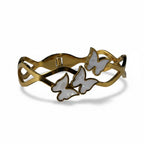 SVORA gold-plated stainless steel bracelet with three mother-of-pearl butterflies and wave-edged band.