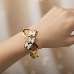 SVORA gold-plated stainless steel bracelet with three mother-of-pearl butterflies