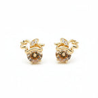 SVORA gold tone apple stud earrings with champagne crystals and small diamond accents.