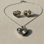 SVORA champagne crystal heart necklace and earrings set with silver bezels and chain. Free-form faceted stones.