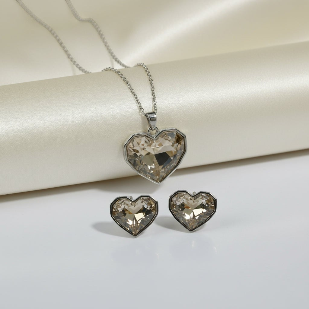 SVORA champagne crystal heart necklace and earrings set with silver bezels. Statement jewelry.