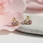 SVORA gold leaf cherry stud earrings with pink and clear cubic zirconia stones.