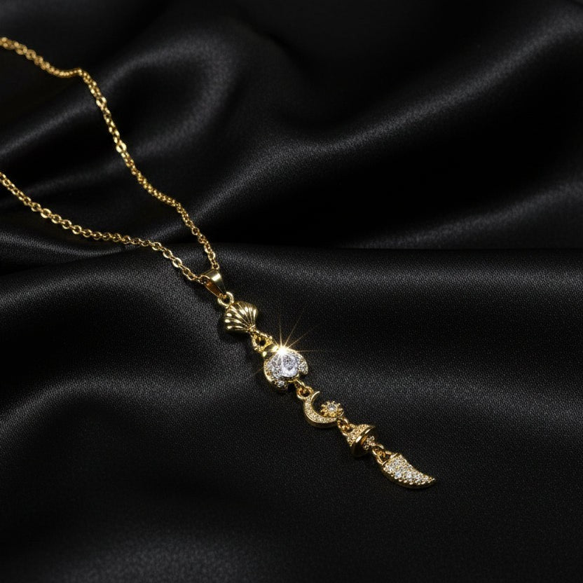 SVORA gold plated stainless steel necklace with shell, bee, moon, heart, and leaf charms. Waterproof, anti-tarnish.