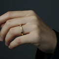 SVORA Lumiere Confetti Slim Ring in gold, 18K gold plated stainless steel with scattered stones. Modern, stackable.