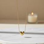 SVORA gold-plated stainless steel Dew Drop Heart Necklace with a high polish finish.