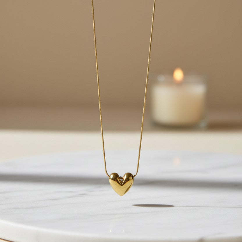 SVORA gold-plated stainless steel Dew Drop Heart Necklace with a high polish finish.