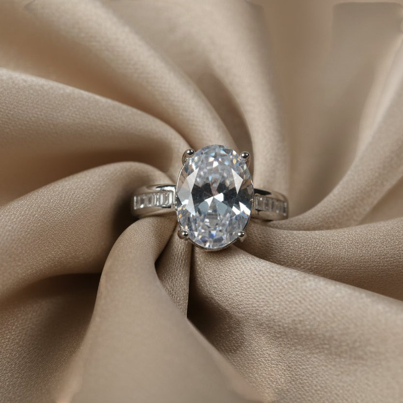 SVORA Ethereal Diamond Solitaire Ring with oval-cut clear stone and baguette band, silver stainless steel.