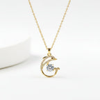 SVORA gold-plated stainless steel necklace with a pavé crystal dolphin pendant holding a large white CZ.