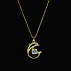 SVORA gold-tone stainless steel necklace with a pavé crystal dolphin pendant holding a large clear CZ.