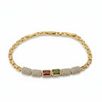SVORA gold-tone stainless steel bracelet with red and green gemstones and pave crystal accents