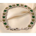 SVORA Emerald Halo Tennis Bracelet with alternating green and olive princess-cut CZ stones, silver-plated stainless steel.