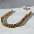 SVORA Emerald Double Row Tennis Bracelet with gold plating and green CZ stones. Features a double row design for added presence.