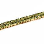 SVORA Emerald Double Row Tennis Bracelet with gold plating and prong-set green CZ stones.