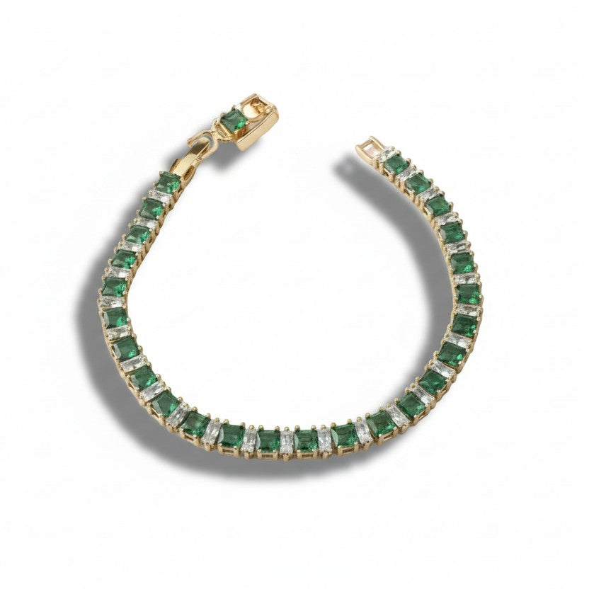 SVORA Emerald Tennis Adjustable Bracelet with alternating emerald green and clear stones, 18k gold-plated stainless steel.