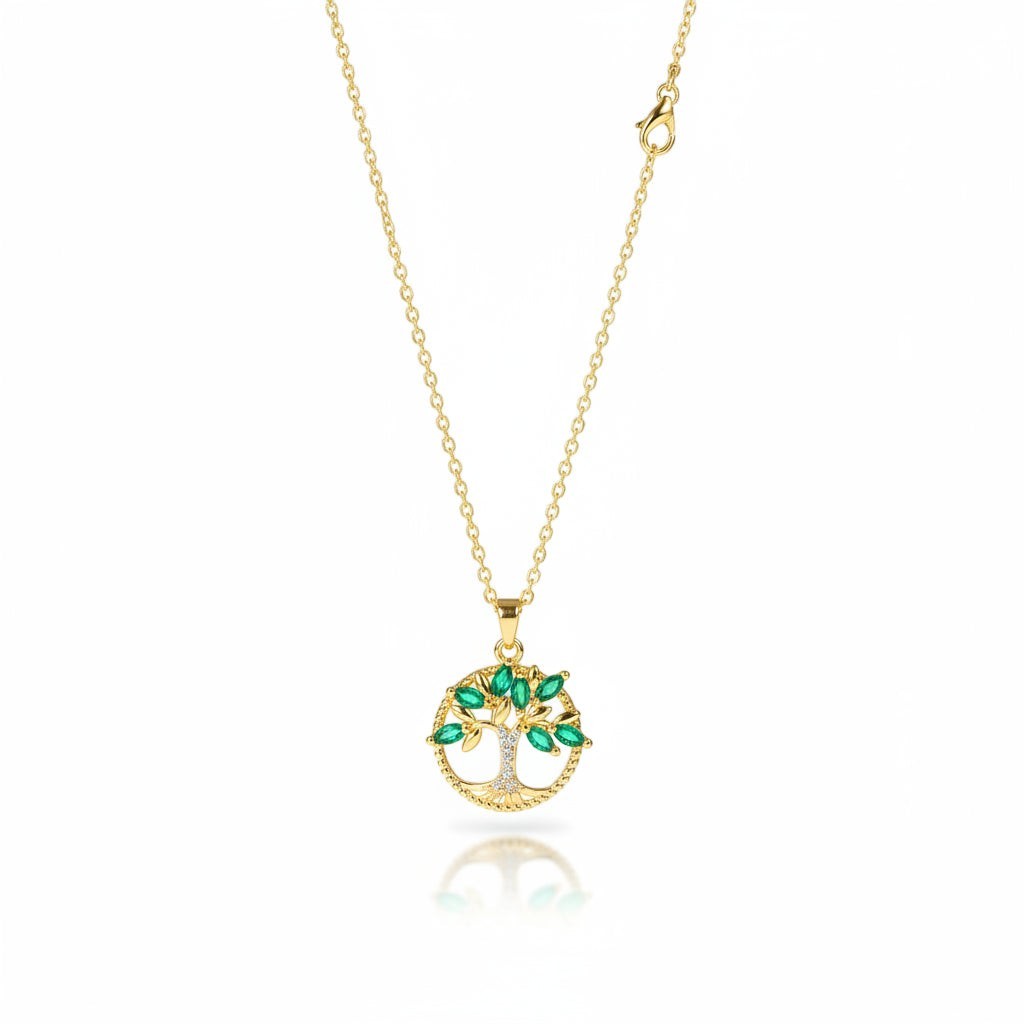 SVORA gold plated stainless steel necklace with emerald marquise CZ leaves and diamond accent Tree of Life pendant.
