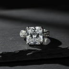 SVORA Ethereal Botanica Solitaire Ring with a princess-cut clear stone and leaf-motif filigree band, made of rhodium-plated stainless steel.