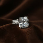 SVORA Ethereal Botanica Solitaire Ring with princess-cut clear stone and leaf-motif band, rhodium-plated stainless steel.