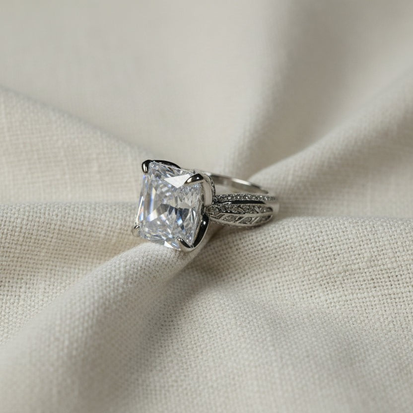 SVORA Ethereal Botanica Solitaire Ring with princess-cut clear stone and leaf filigree band, silver stainless steel.