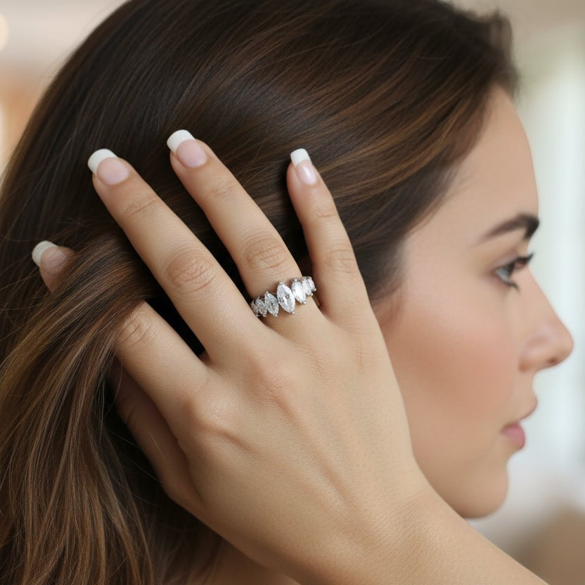 SVORA Ethereal Crystal Crown Ring with seven marquise-cut clear stones on a rhodium-plated band.