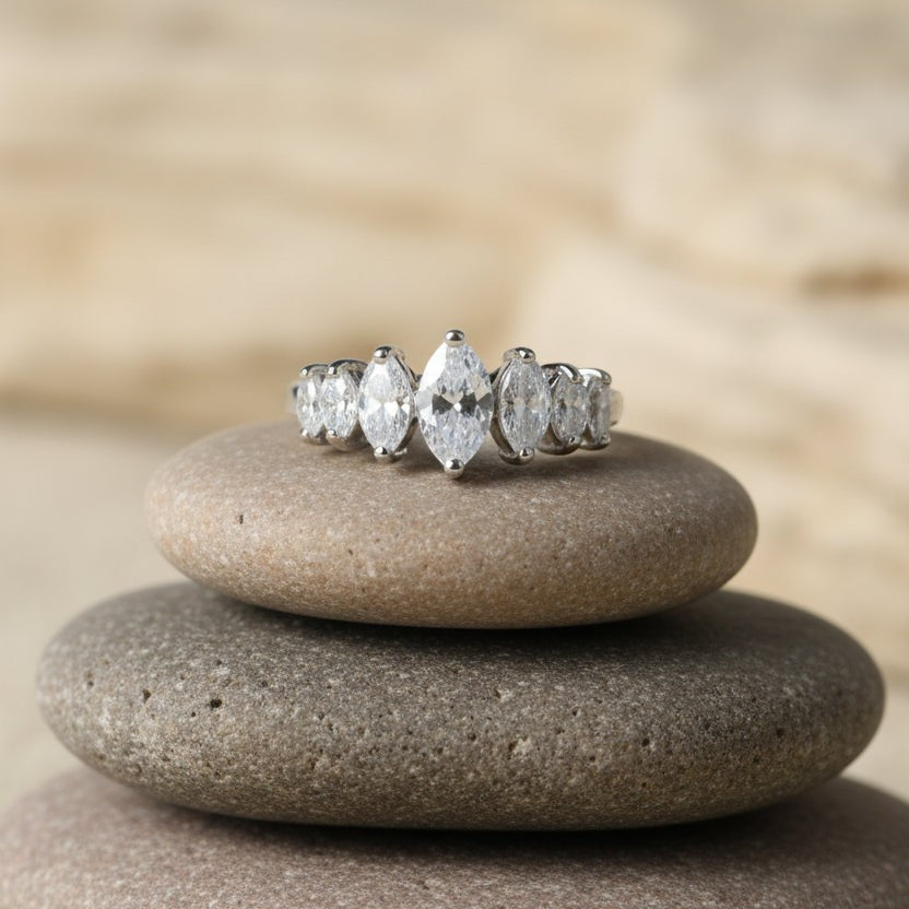 SVORA Ethereal Crystal Crown Ring with seven marquise-cut clear stones on a rhodium-plated band. Hypoallergenic stainless steel.