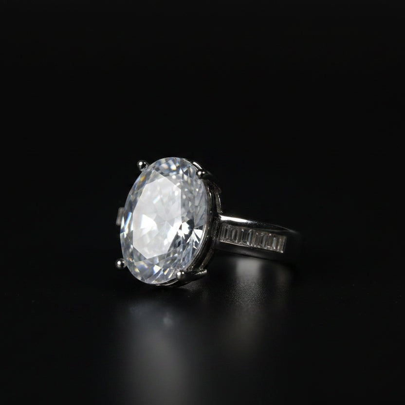 SVORA Ethereal Diamond Solitaire Ring with large oval-cut clear stone and baguette band on rhodium-plated stainless steel.