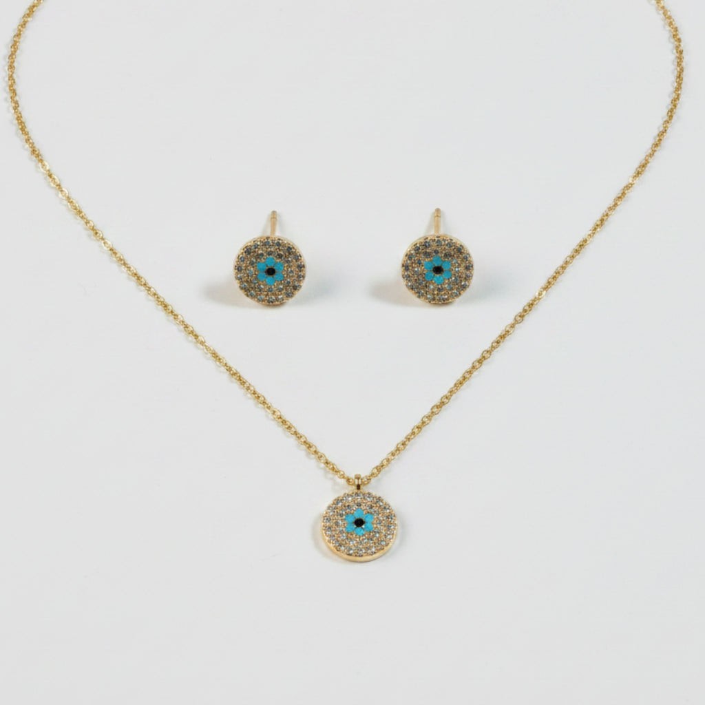 SVORA gold tone stainless steel evil eye necklace and earrings set with cubic zirconia and turquoise accents.