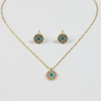 SVORA gold tone stainless steel evil eye necklace and earrings set with cubic zirconia and turquoise accents.