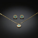 SVORA gold tone stainless steel evil eye necklace and earrings set with cubic zirconia and turquoise.