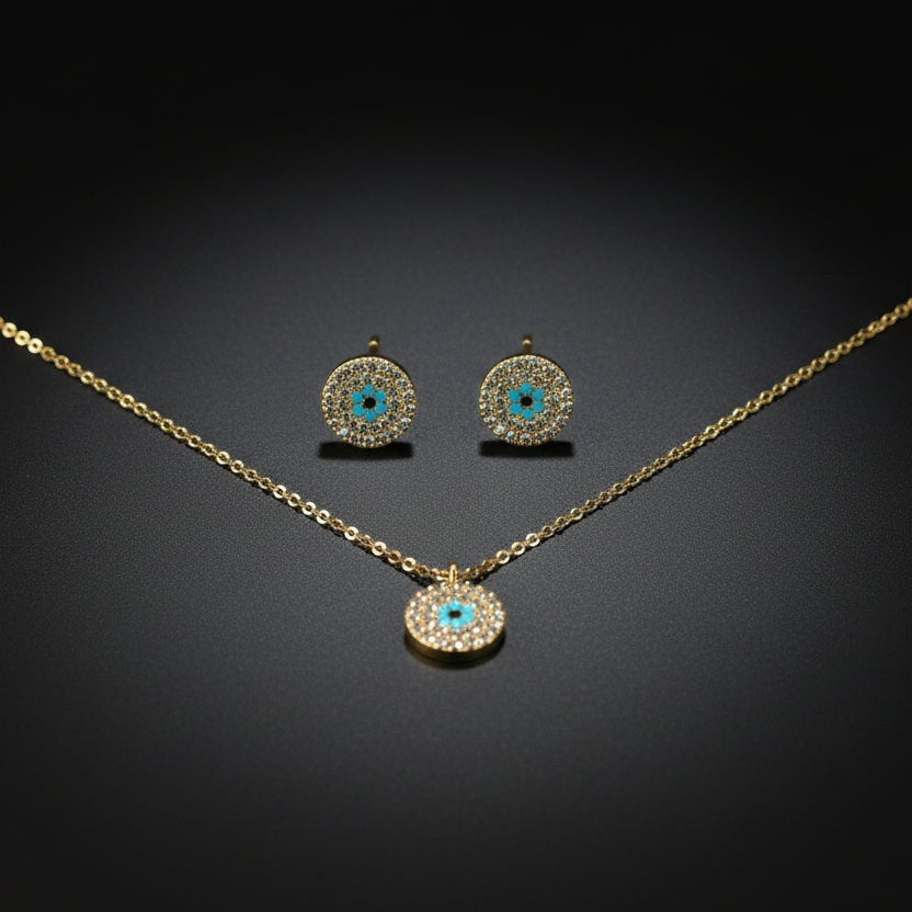 SVORA gold tone stainless steel evil eye necklace and earrings set with cubic zirconia and turquoise.