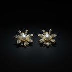 SVORA flower bloom pearl stud earrings with gold plating and sparkling crystals.