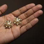 SVORA gold flower bloom pearl stud earrings with pavé and baguette crystals