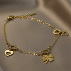 SVORA gold-plated stainless steel bracelet with flower, heart charms and hollow circles. Adjustable.