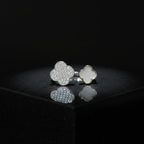 SVORA Toi et Moi Fortune Clover Ring with pavé clear stones and mother of pearl on a silver band.